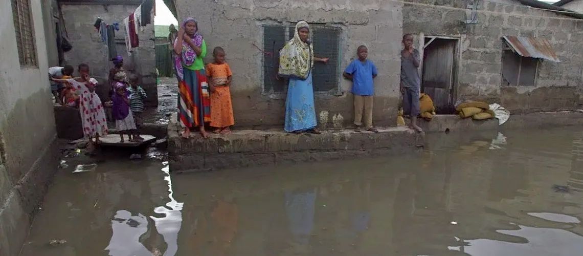 Local residents wait for waters to subside in Dar es Salaam, Tanzania