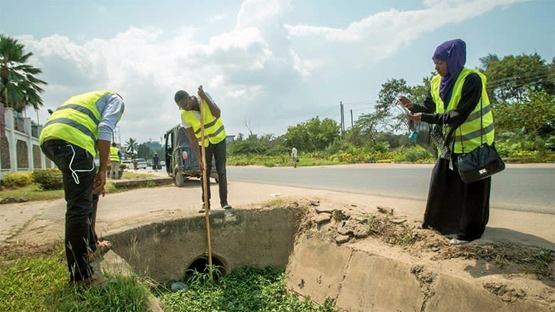 Young Tanzanians plan their next steps for a local community risk mapping exercise.