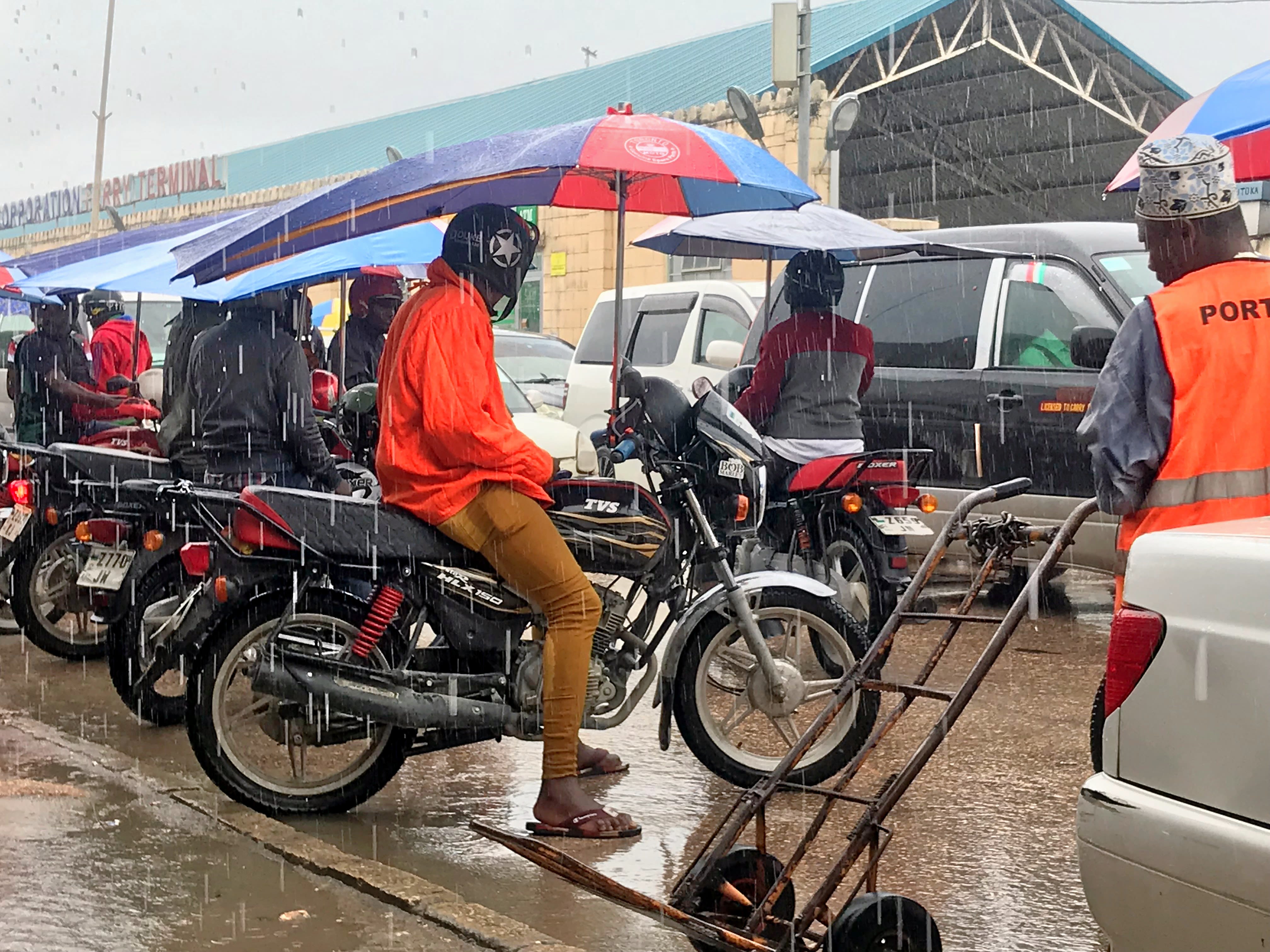 Rainy day for motorbike taxi drivers in Dar es Salaam